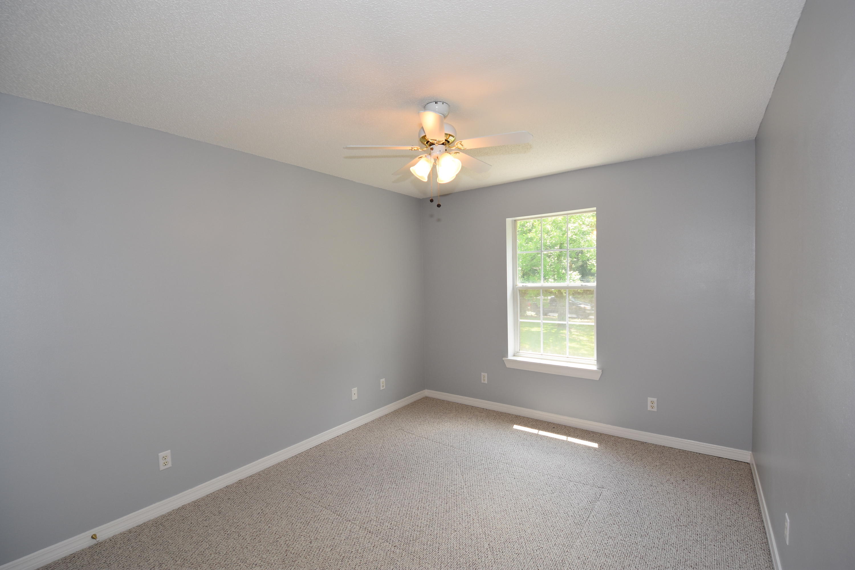 5817 Dairy Road Baker, FL 32531 - Photo 24 of 36 an empty room that has a window