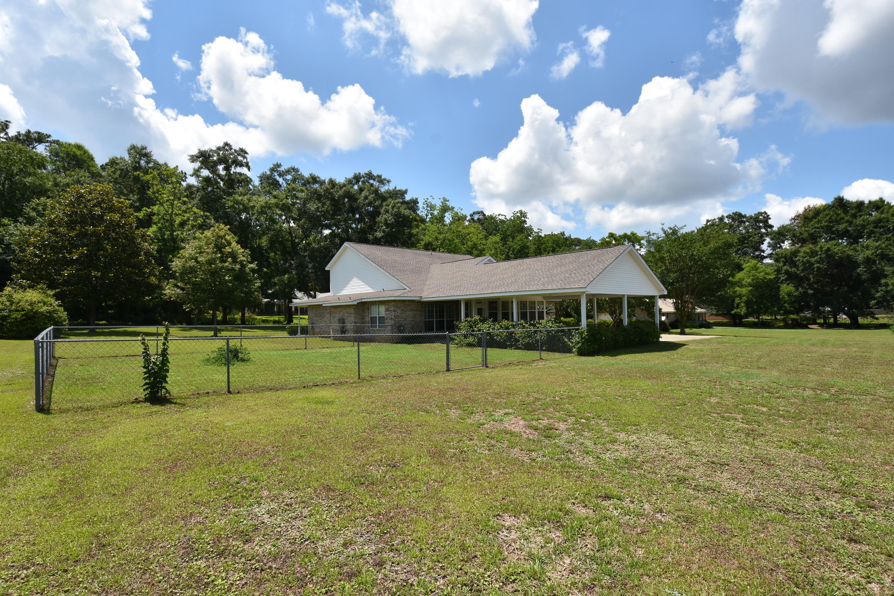 5817 Dairy Road Baker, FL 32531 - Photo 28 of 36 a view of an house with a yard