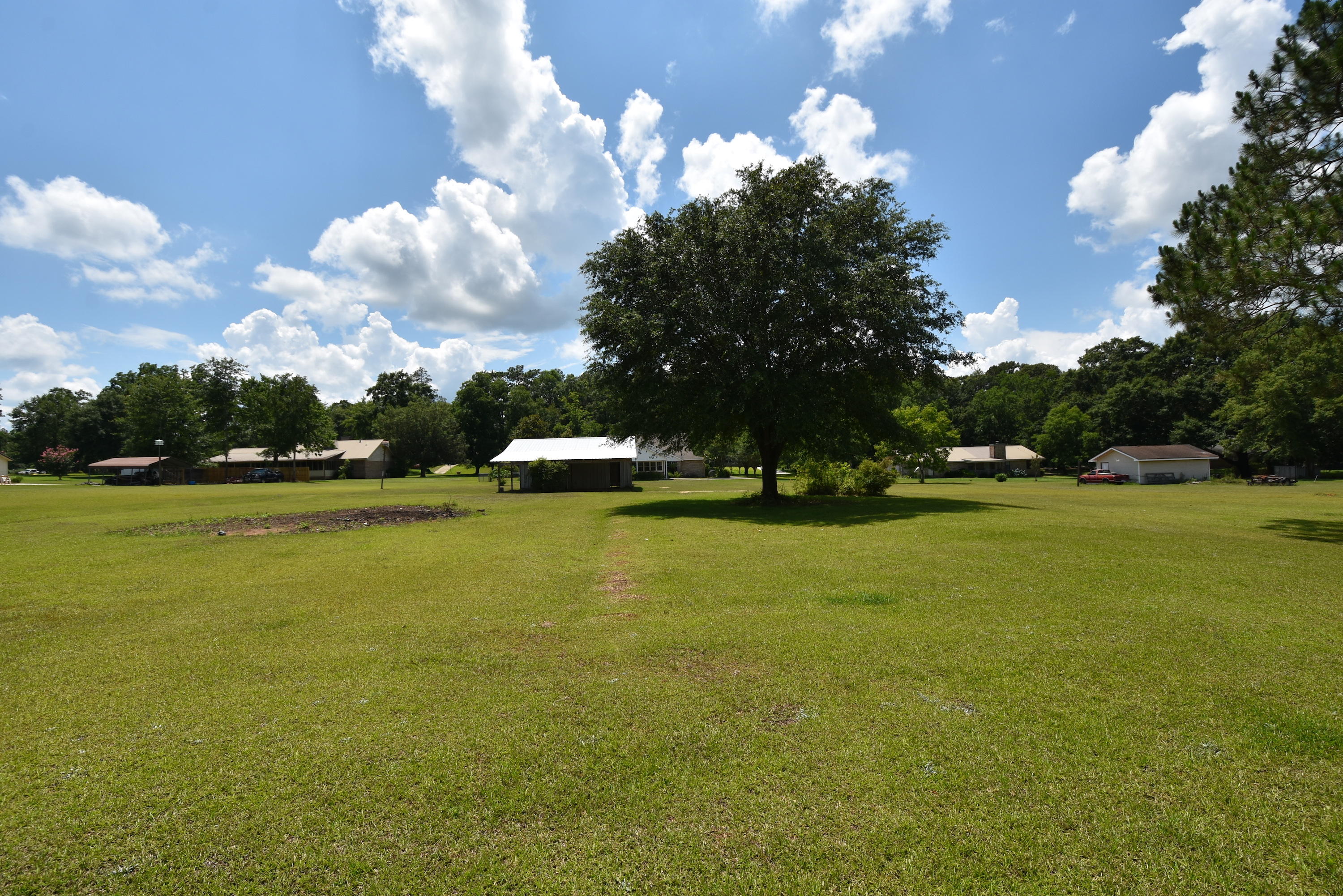 5817 Dairy Road Baker, FL 32531 - Photo 30 of 36 a view of a lake with houses