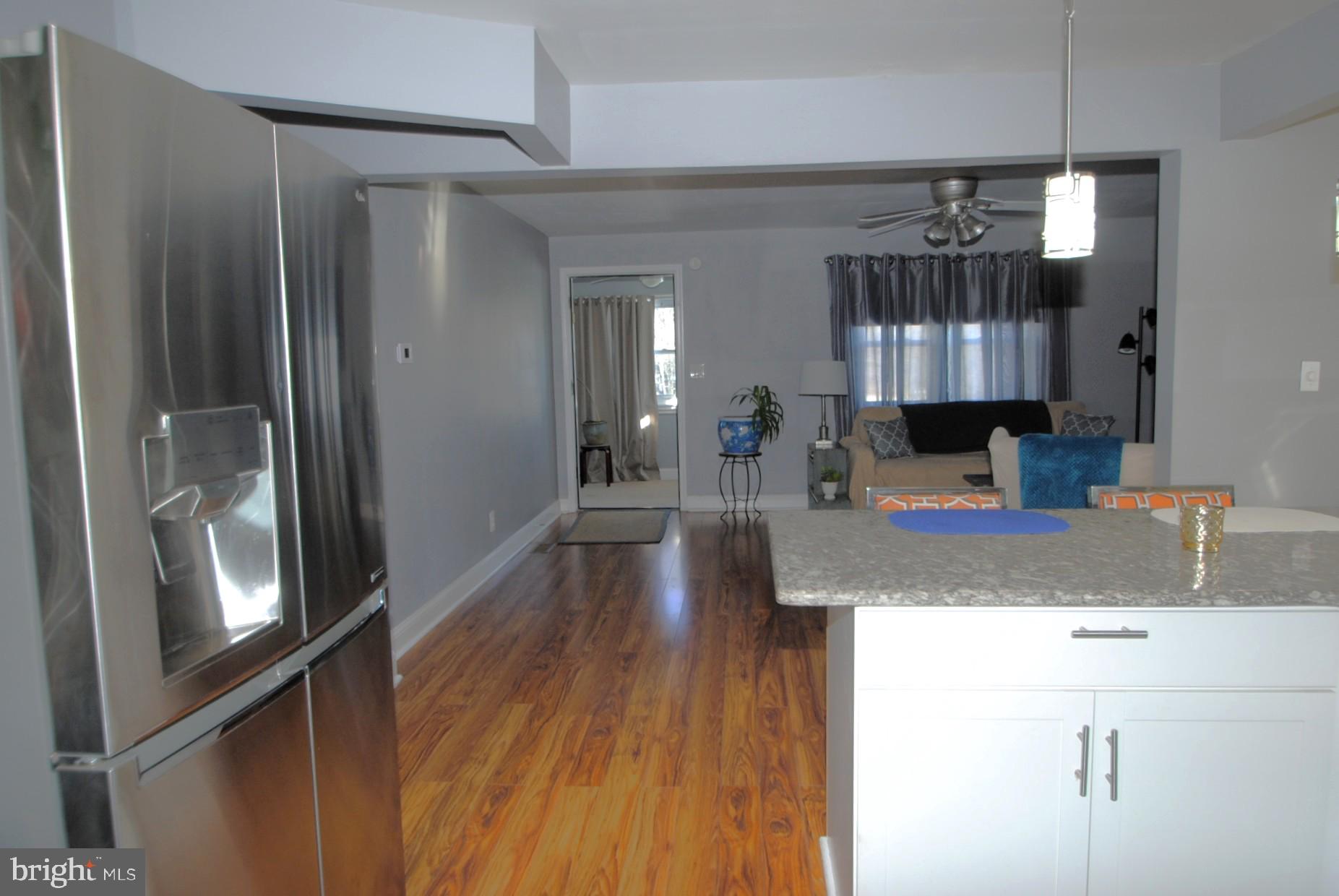400 West Holly Oak Road Wilmington, DE 19809 - Photo 28 of 60 View from kitchen to LR over breakfast bar