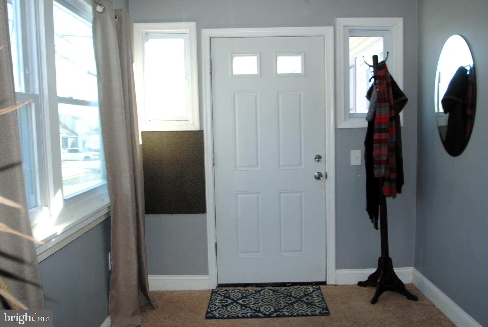 400 West Holly Oak Road Wilmington, DE 19809 - Photo 8 of 60 Porch - Sunroom view to main entrance