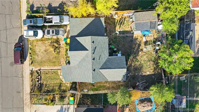 an aerial view of residential houses and outdoor space