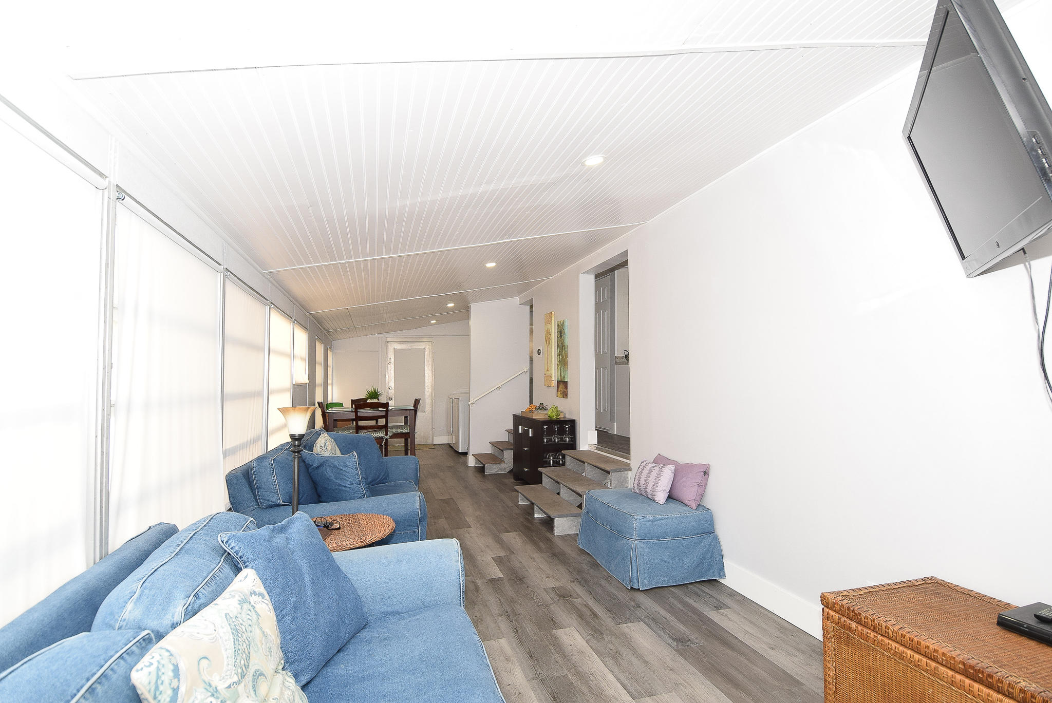 110 Tweedy Pie Terrace Key Largo, FL 33037 - Photo 8 of 21 a living room with furniture and a flat screen tv