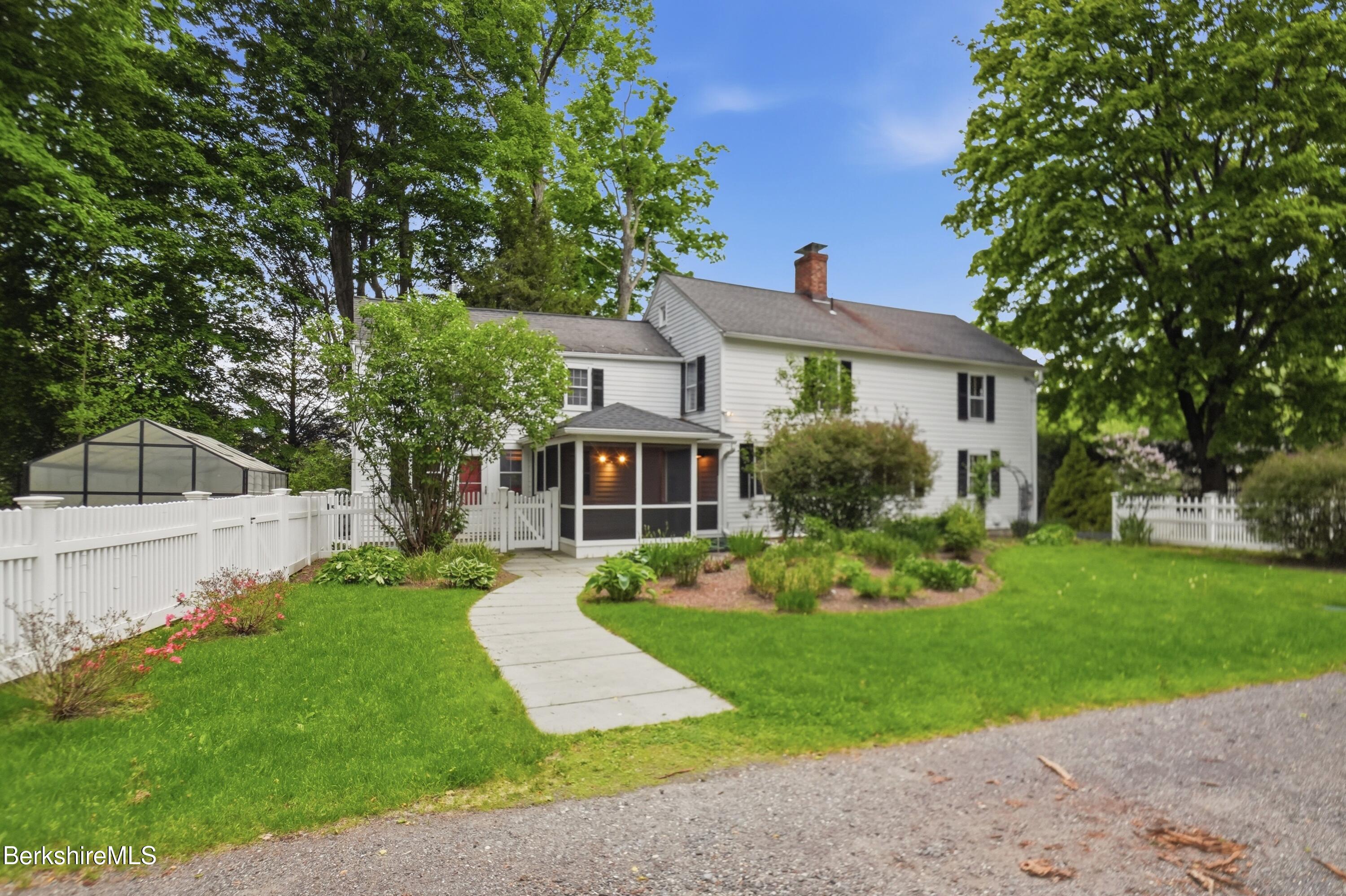 4 Stockbridge Road West Stockbridge, MA 01266 - Photo 9 of 94 a front view of a house with garden