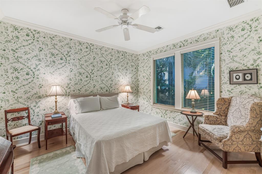 1601 Jean Lafitte Drive Boca Grande, FL 33921 - Photo 14 of 54 a bed room with a bed and a couch