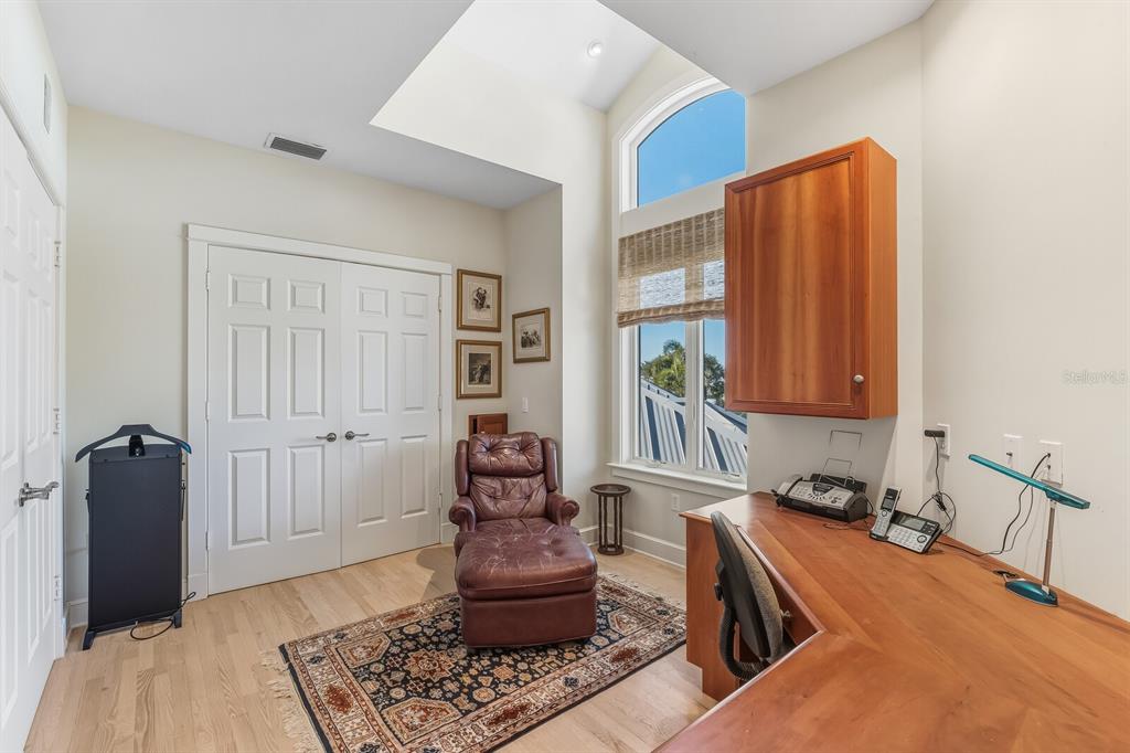 1601 Jean Lafitte Drive Boca Grande, FL 33921 - Photo 24 of 54 a living room with furniture and a window