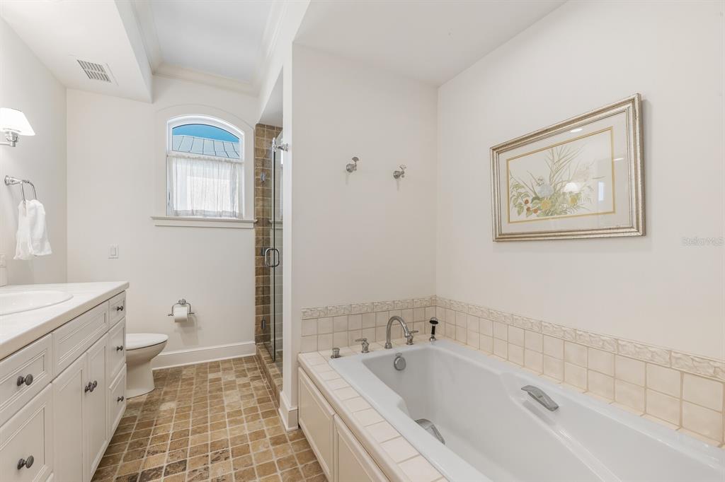 1601 Jean Lafitte Drive Boca Grande, FL 33921 - Photo 31 of 54 a bathroom with a bathtub toilet and sink