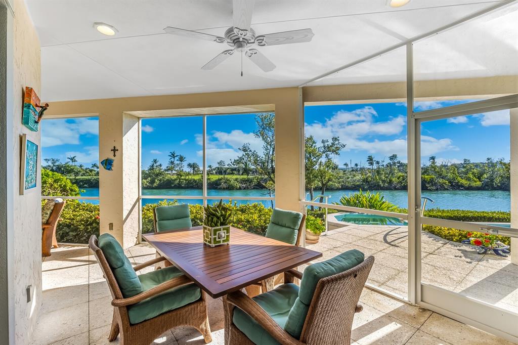 1601 Jean Lafitte Drive Boca Grande, FL 33921 - Photo 34 of 54 a view of a dining room with furniture window and outside view