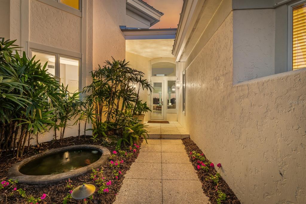 1601 Jean Lafitte Drive Boca Grande, FL 33921 - Photo 49 of 54 a bathroom with sink and mirror