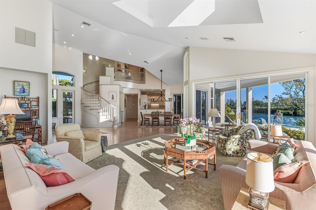 1601 Jean Lafitte Drive Boca Grande, FL 33921 - Photo 6 of 54 a living room with fireplace furniture and a large window