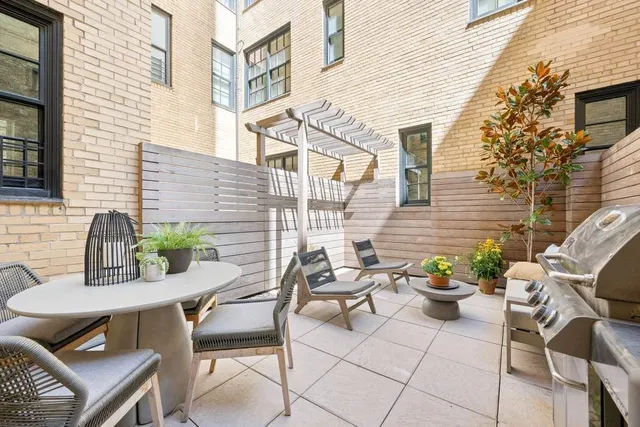 a spacious bathroom with a sink and a mirror