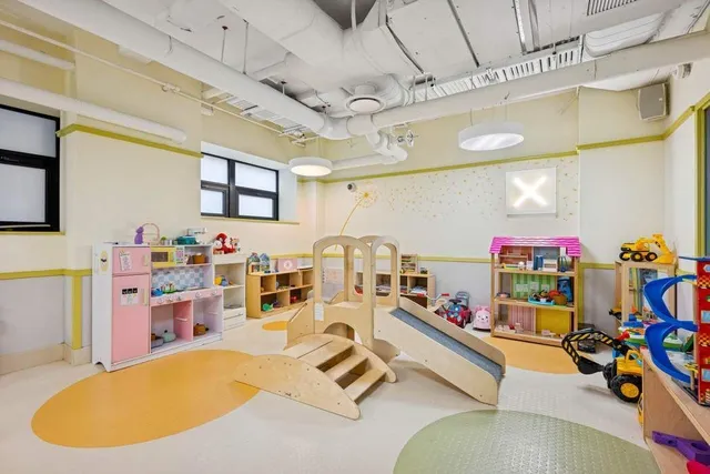 a view of parking garage with cars