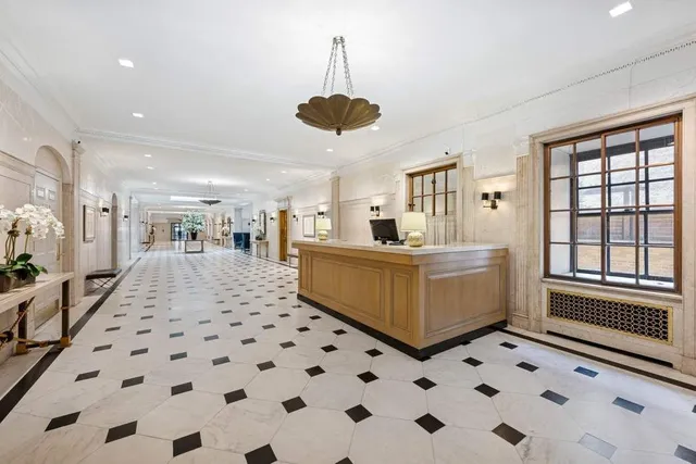 a view of roof deck with patio