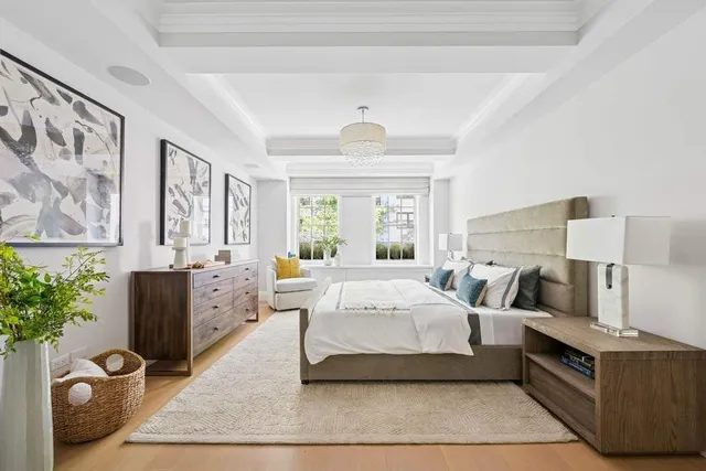 a view of a livingroom with furniture and wooden floor