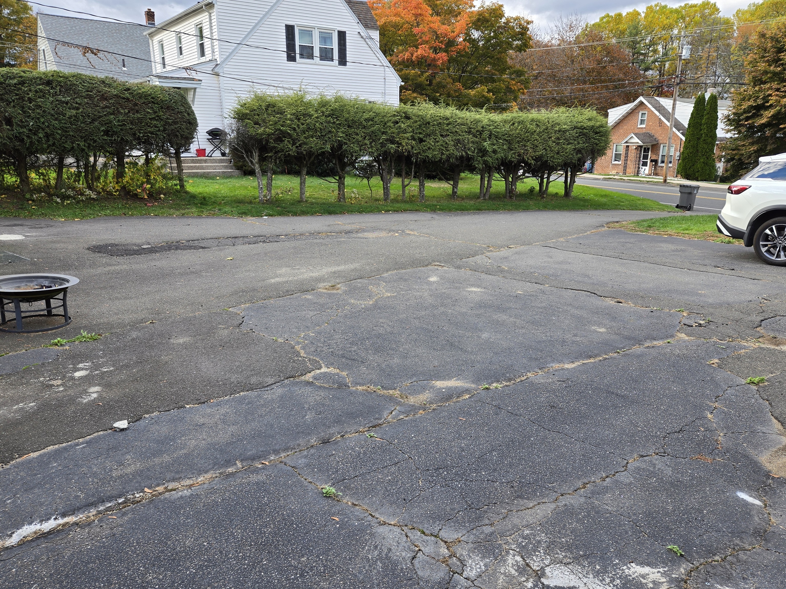 102 East Road Bristol, CT 06010 - Photo 3 of 15 a view of a street with houses