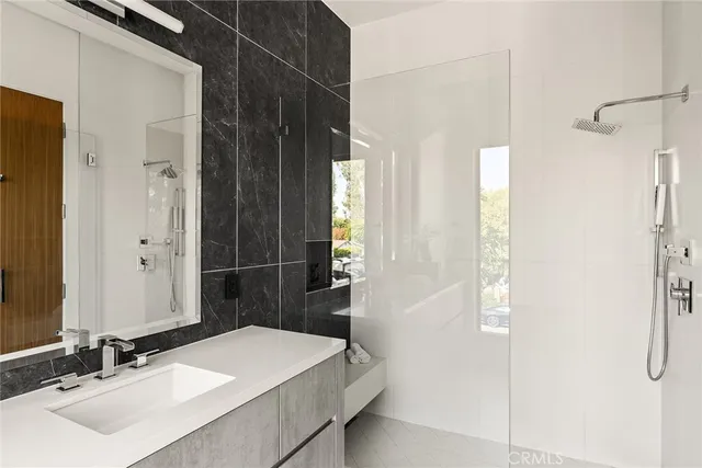 a bedroom with bed and a window