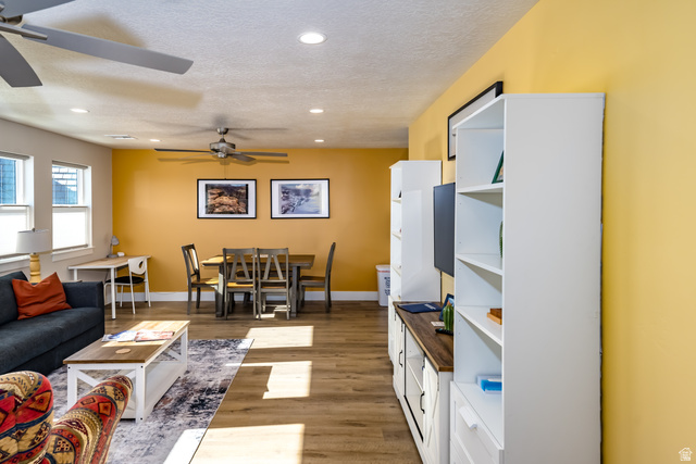 1283 North Gallen Road Santa Clara, UT 84765 - Photo 75 of 103 Living area featuring light wood-style floors, recessed lighting, ceiling fan, and a textured ceiling