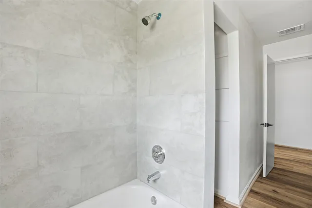 a bathroom with a bathtub