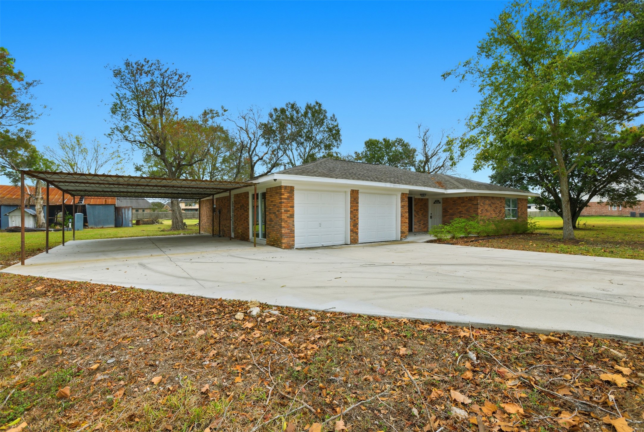 2751 Piper Road Pearland, TX 77581 - Photo 2 of 24 a view of a house with a yard