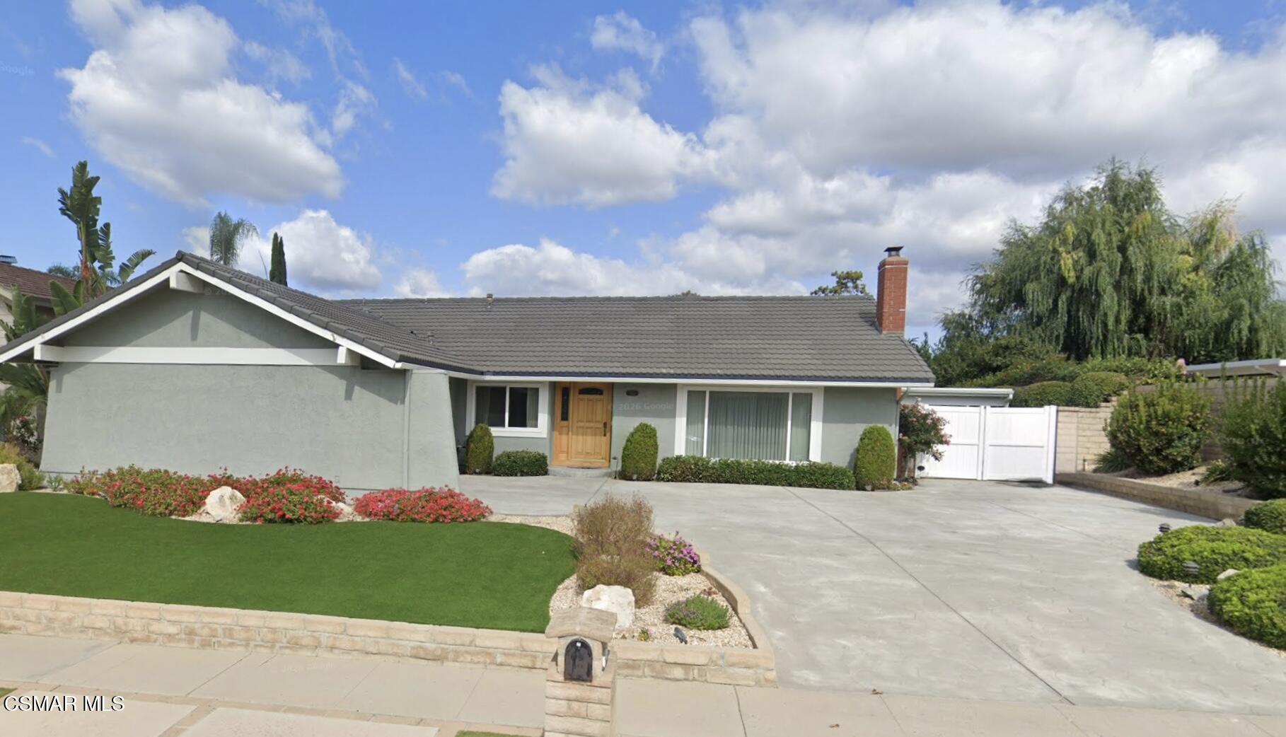 681 Weaver Street Simi Valley, CA 93065 - Photo 1 of 1 a front view of a house with a yard and garage