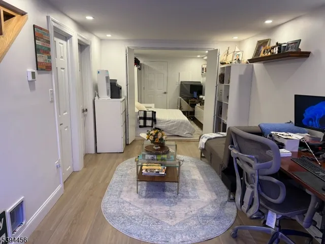 a view of a living room and dining room