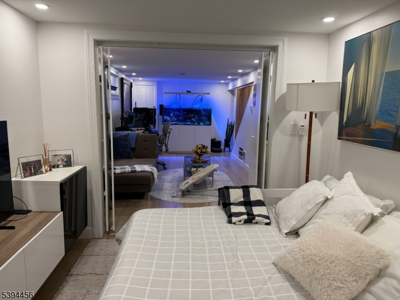 18 Aubrey Street Summit, NJ 07901 - Photo 13 of 20 a living room with furniture and a flat screen tv