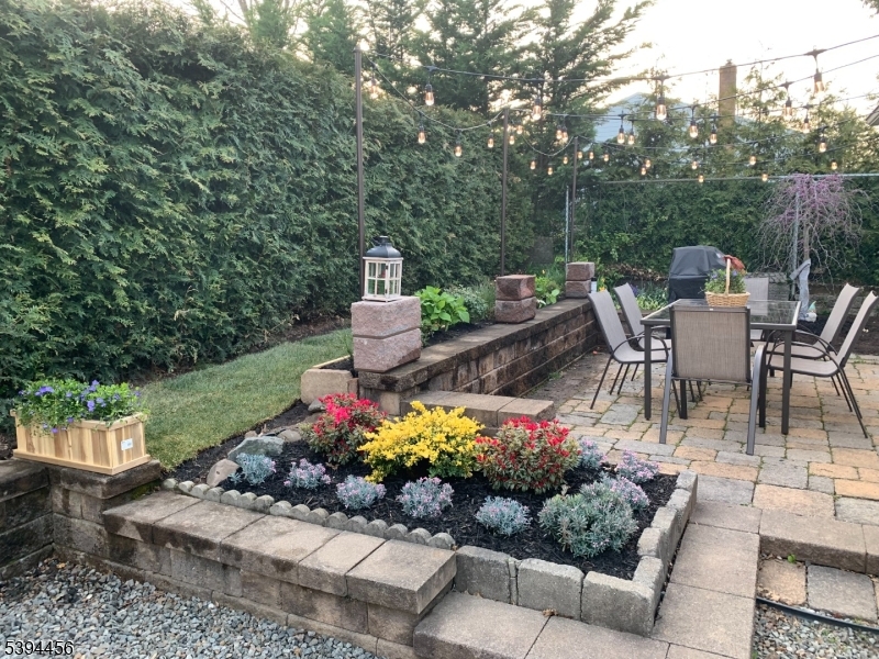 18 Aubrey Street Summit, NJ 07901 - Photo 16 of 20 a view of a tables and chairs and potted on the water