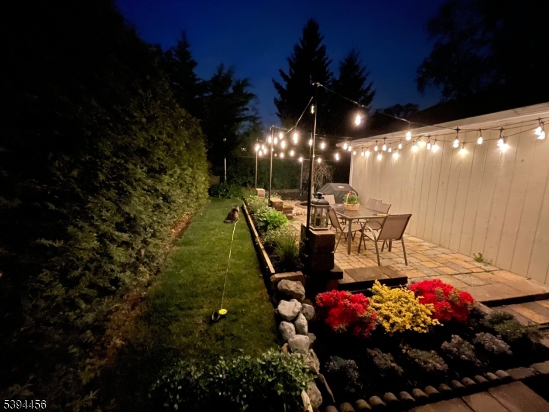 18 Aubrey Street Summit, NJ 07901 - Photo 17 of 20 a view of a chairs and tables in patio