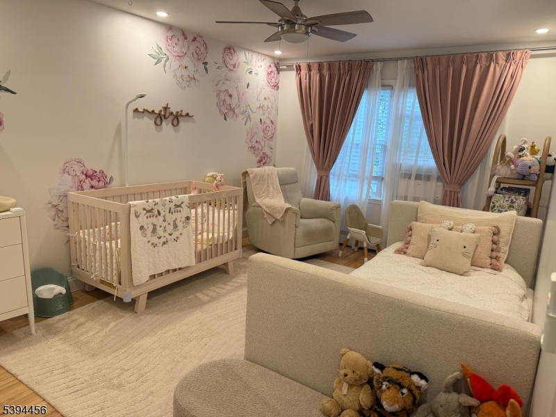 18 Aubrey Street Summit, NJ 07901 - Photo 8 of 20 a bed room with a bed and a couch