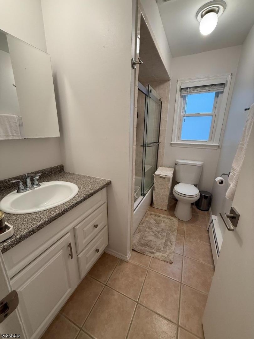 18 Aubrey Street Summit, NJ 07901 - Photo 9 of 20 a bathroom with a granite countertop sink toilet and shower