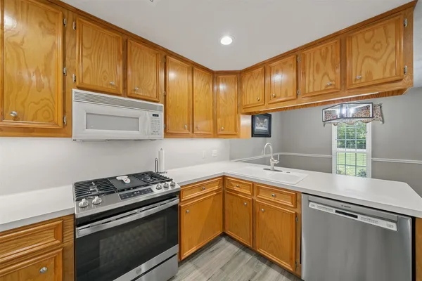 a bathroom with a granite countertop sink mirror and double