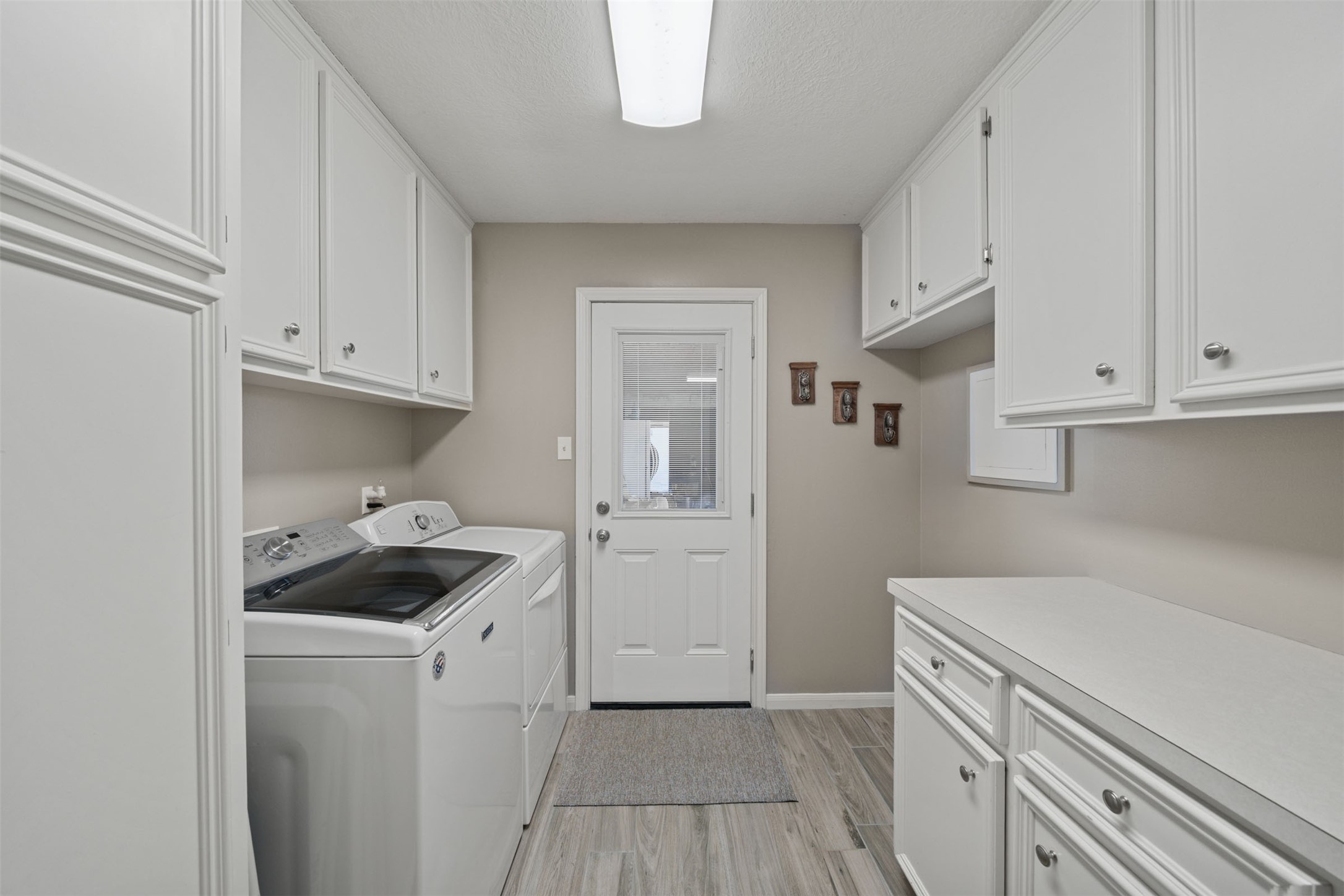 18823 Cypress Church Road Cypress, TX 77433 - Photo 27 of 44 a kitchen with a sink a stove and refrigerator