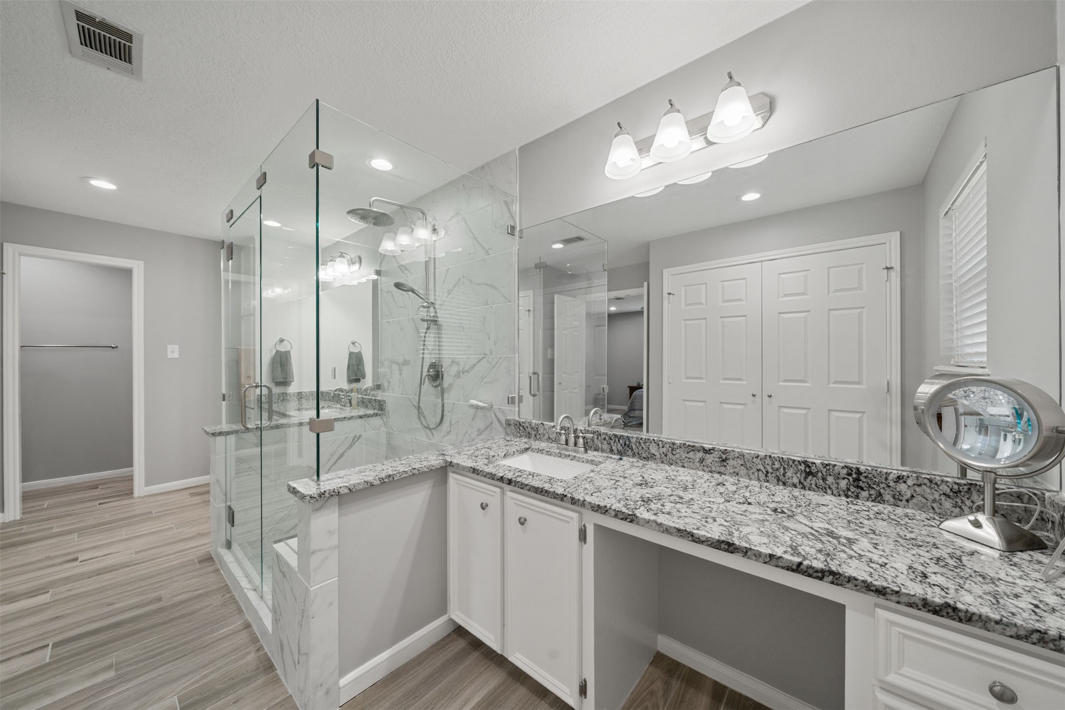 18823 Cypress Church Road Cypress, TX 77433 - Photo 34 of 44 a bathroom with a sink double vanity and a mirror