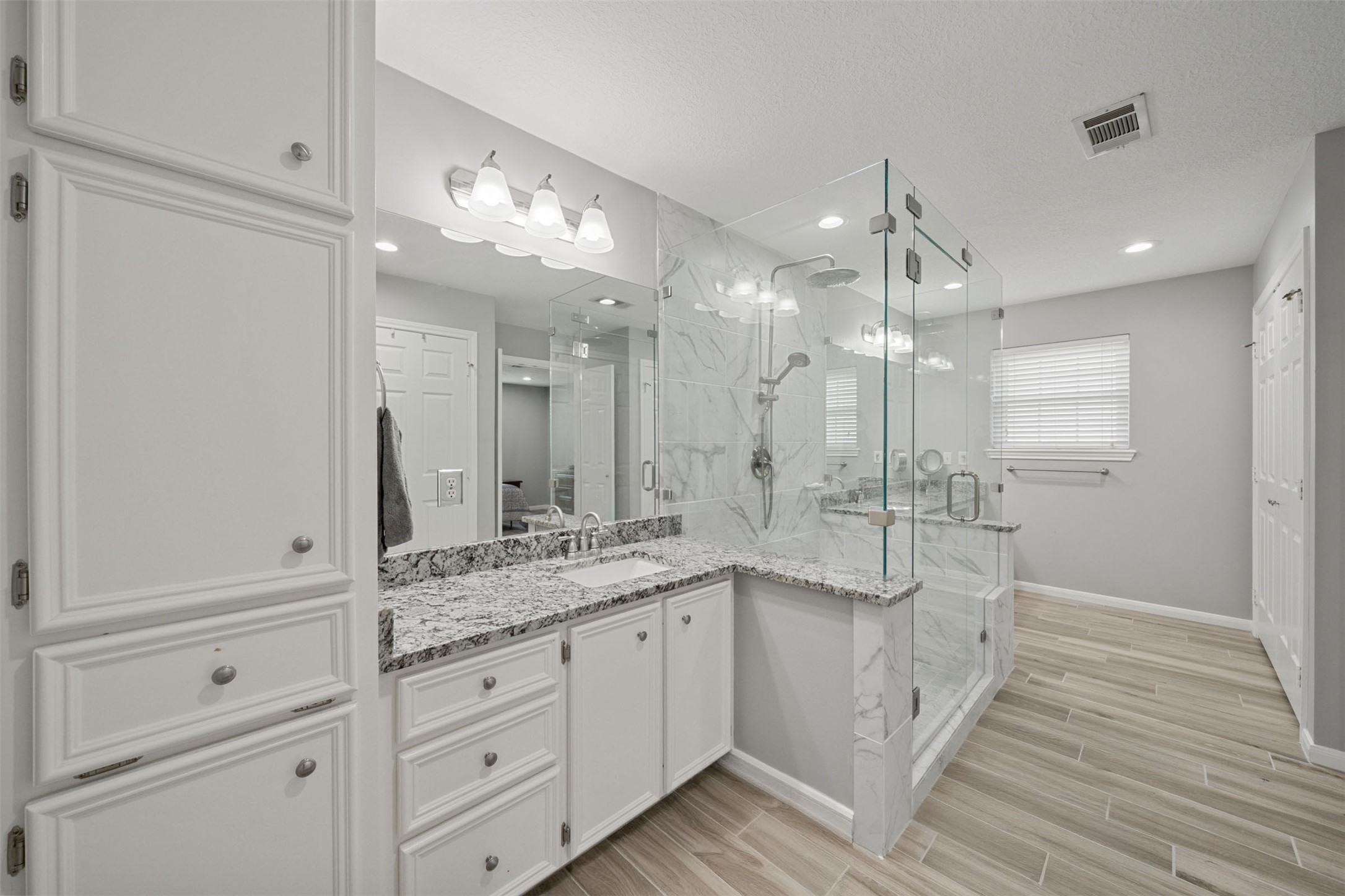 18823 Cypress Church Road Cypress, TX 77433 - Photo 36 of 44 a bathroom with a granite countertop sink mirror and double