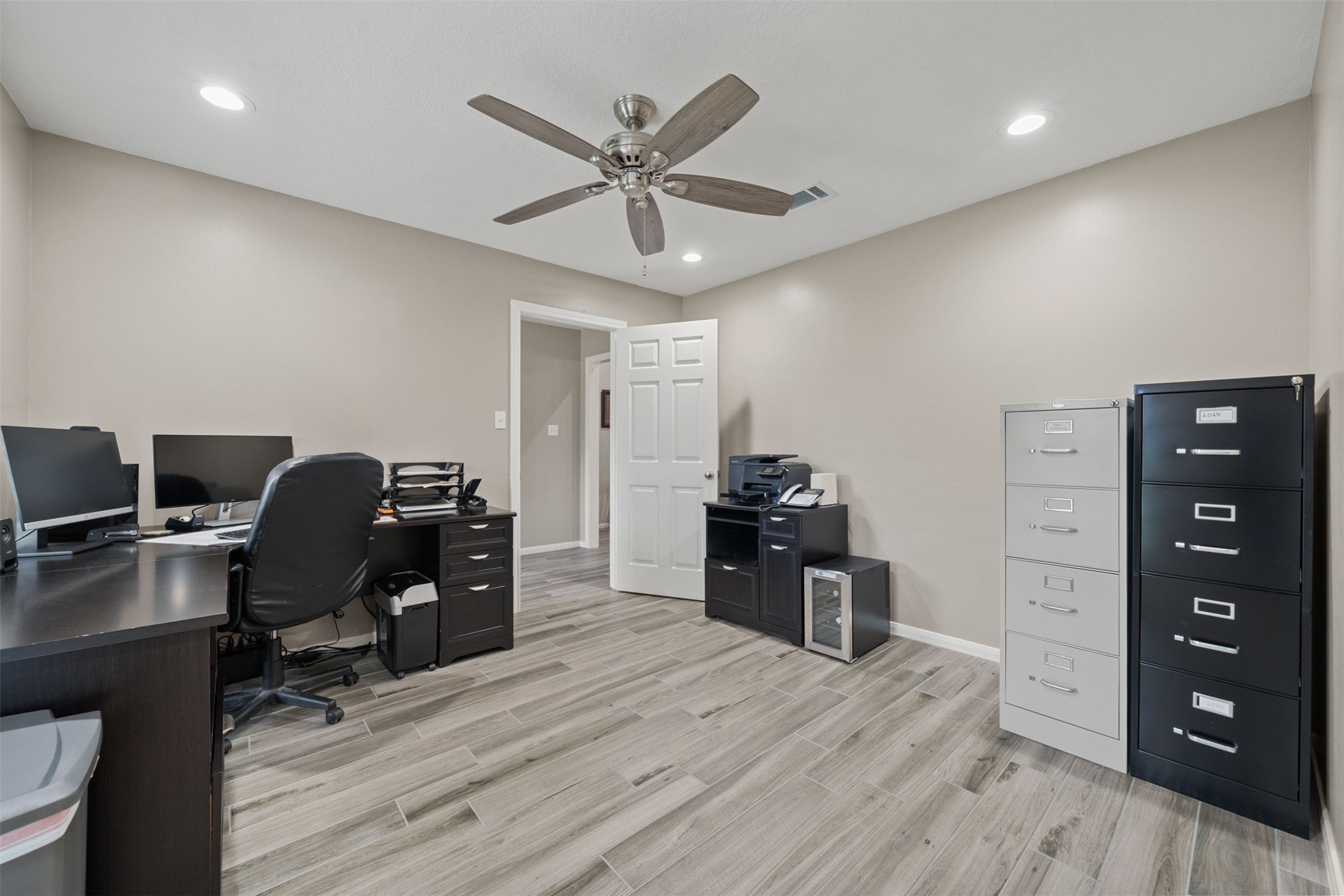 18823 Cypress Church Road Cypress, TX 77433 - Photo 38 of 44 a view of a workspace with furniture and wooden floor