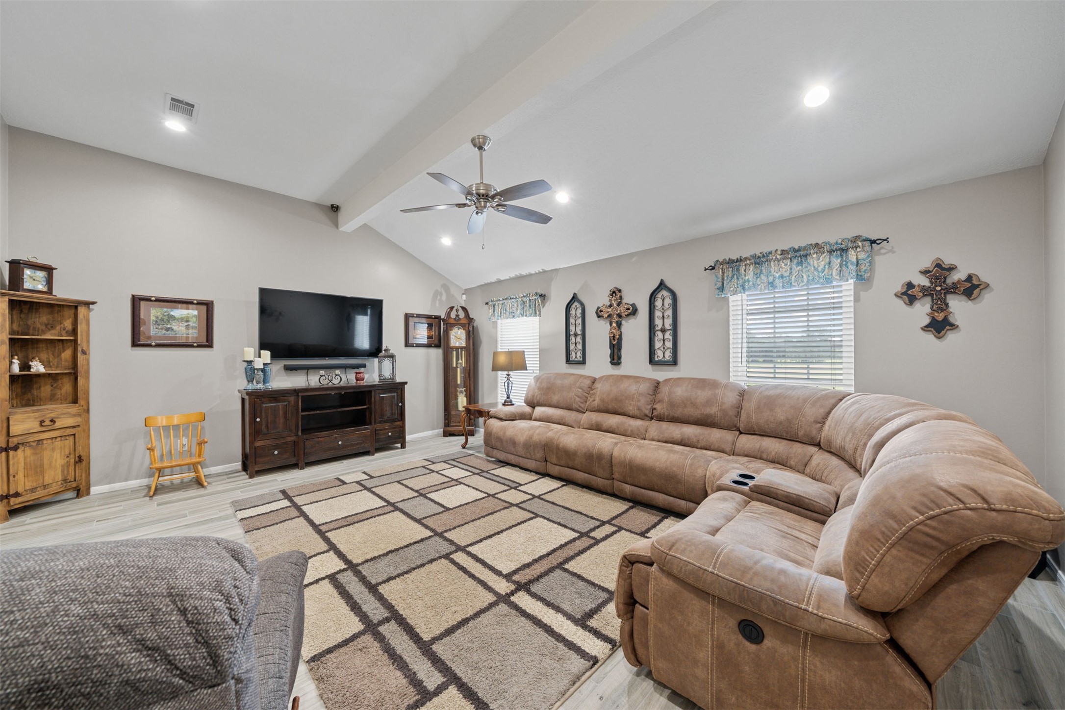 18823 Cypress Church Road Cypress, TX 77433 - Photo 9 of 44 a living room with furniture and a flat screen tv