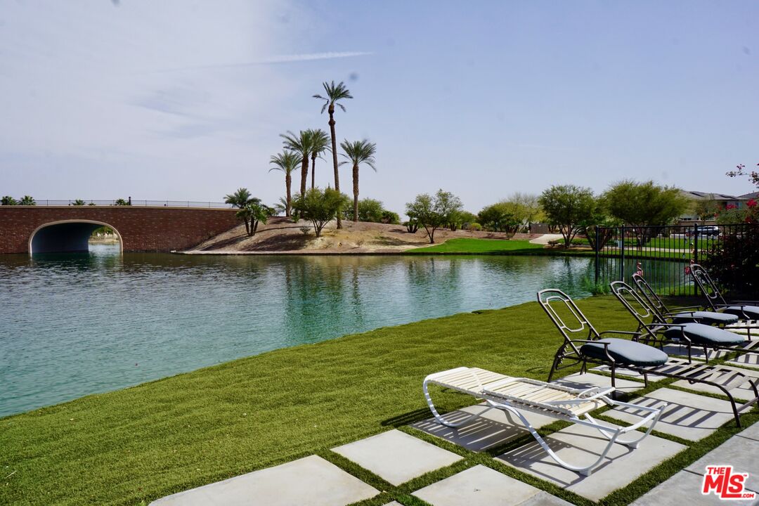 84330 Tramonto Way Indio, CA 92203 - Photo 16 of 18 a view of a lake with houses with outdoor space