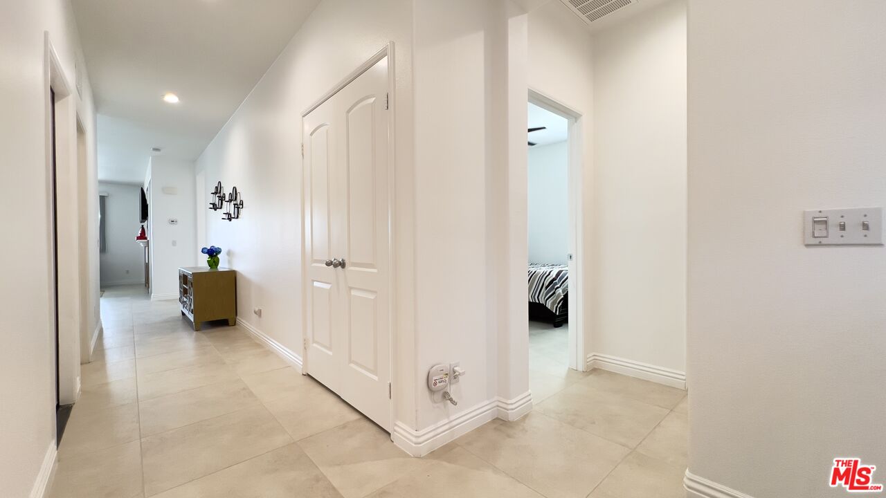 84330 Tramonto Way Indio, CA 92203 - Photo 5 of 18 a view of a livingroom from a hallway