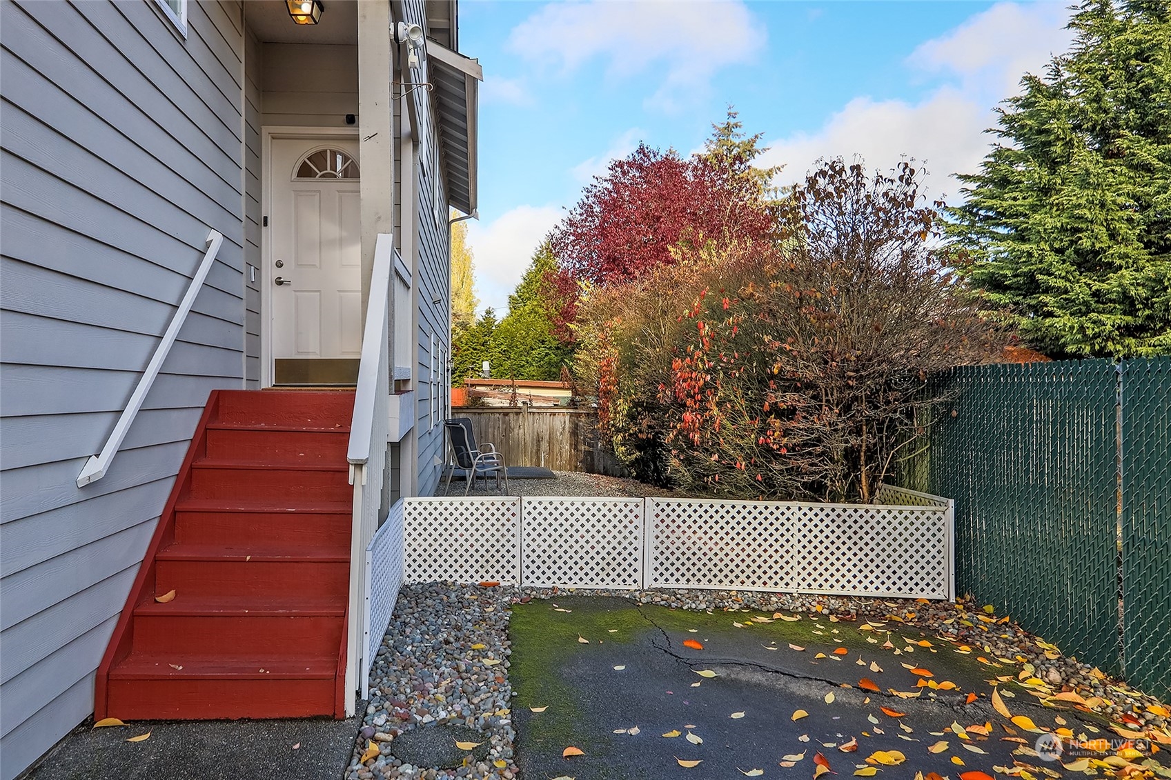 8317 233rd Street Southwest, Unit 3 Edmonds, WA 98026 - Photo 2 of 31 a view of a yard from a balcony