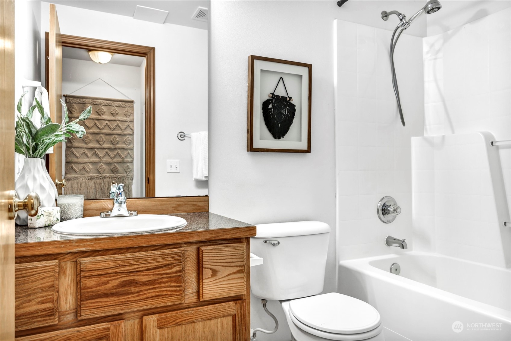 8317 233rd Street Southwest, Unit 3 Edmonds, WA 98026 - Photo 24 of 31 a bathroom with a sink a toilet and shower