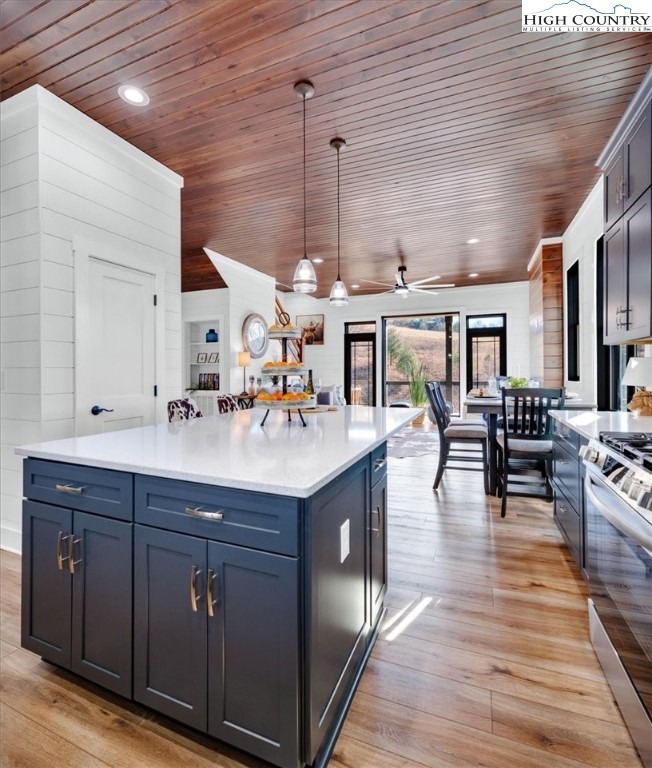 1518 Moxley Ridge Road Independence, VA 24348 - Photo 11 of 50 a living room with furniture a table and kitchen view