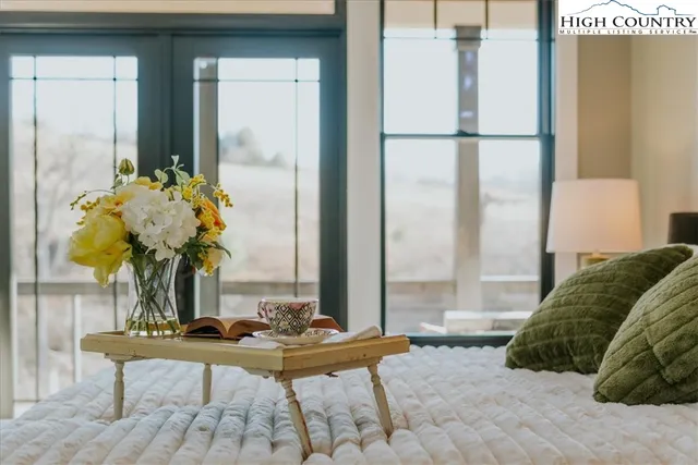 a bathroom with a double vanity sink and mirror