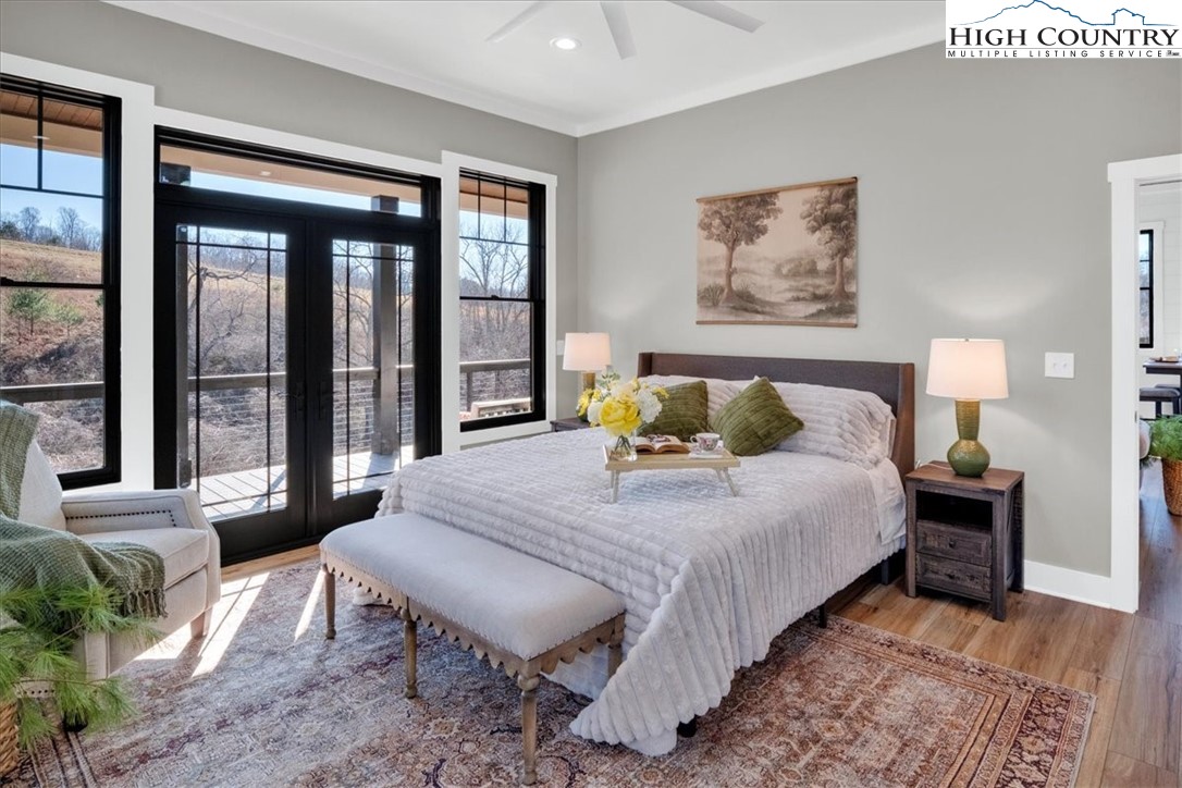 1518 Moxley Ridge Road Independence, VA 24348 - Photo 23 of 50 a bedroom with a bed and a large window