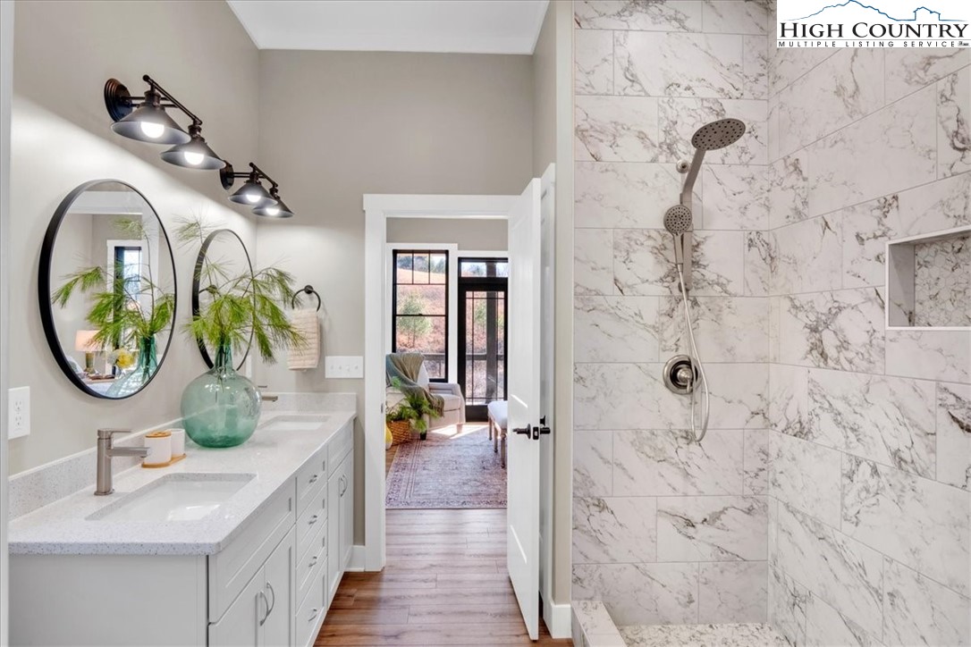 1518 Moxley Ridge Road Independence, VA 24348 - Photo 26 of 50 a bathroom with a sink and a mirror