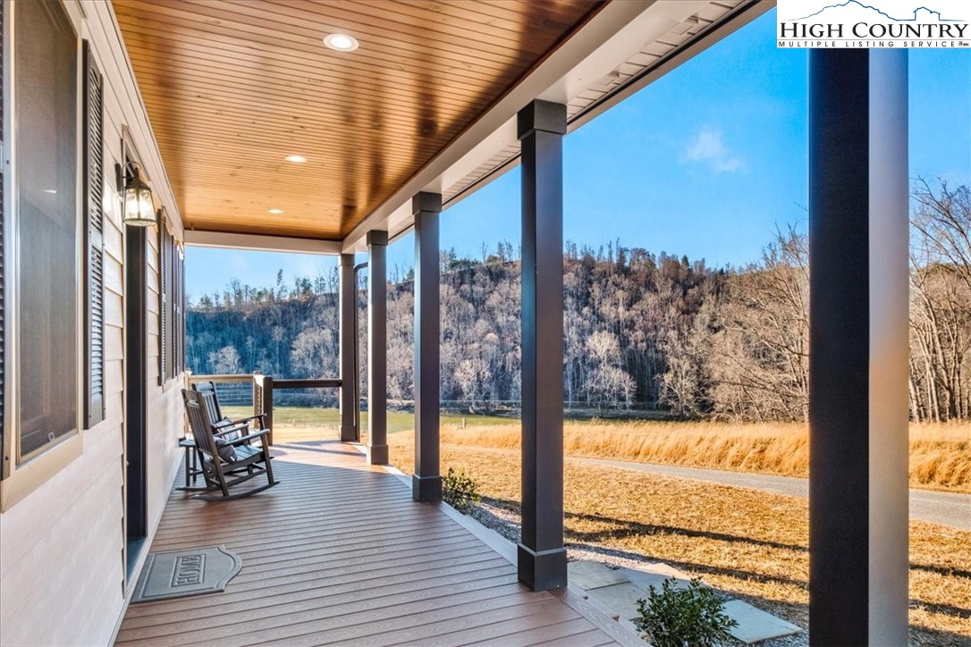 1518 Moxley Ridge Road Independence, VA 24348 - Photo 40 of 50 a view of a room with wooden floor and chair
