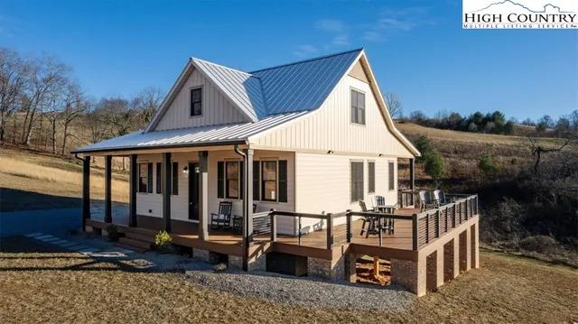 a large kitchen with stainless steel appliances granite countertop a large stove a sink dishwasher and cabinets with wooden floor