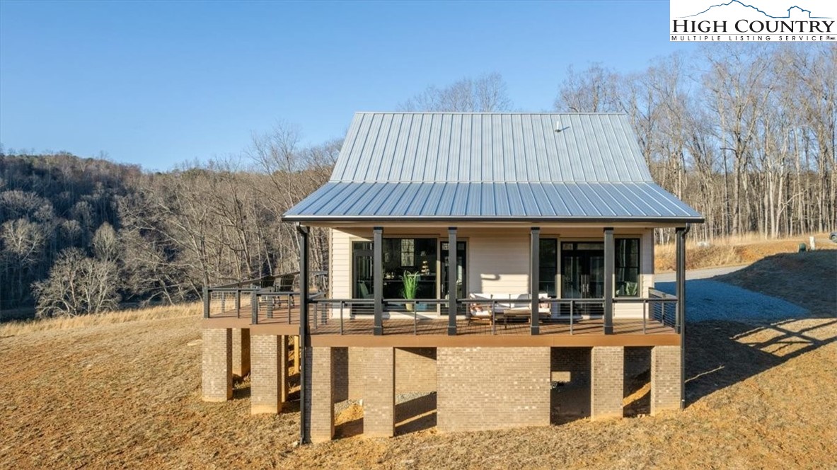 1518 Moxley Ridge Road Independence, VA 24348 - Photo 44 of 50 a view of a house with outdoor seating