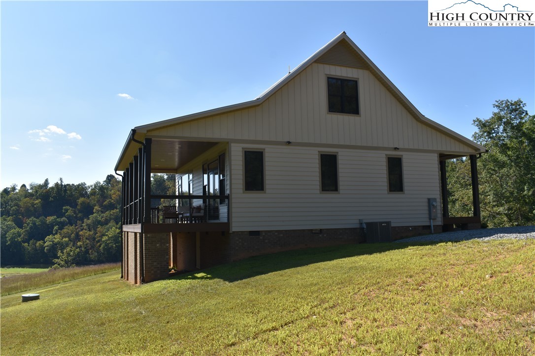 1518 Moxley Ridge Road Independence, VA 24348 - Photo 49 of 50 a front view of a house with a yard