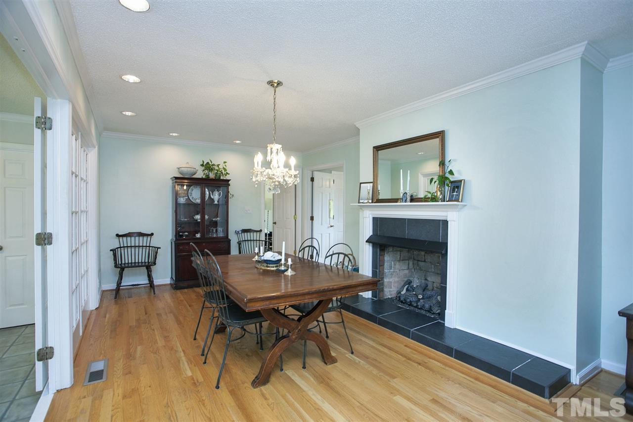 1901 French Drive Raleigh, NC 27612 - Photo 14 of 25 a living room with furniture and a fireplace