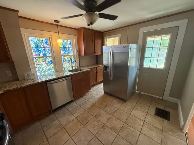 a view of a kitchen with window